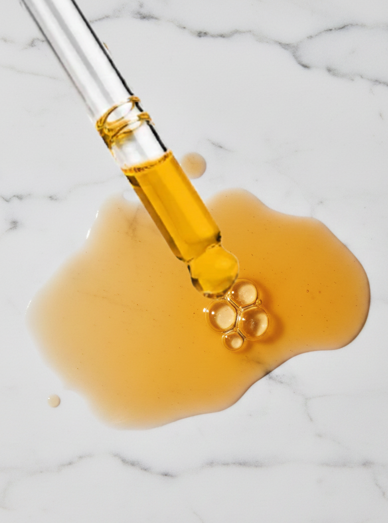 Yellow liquid on marble